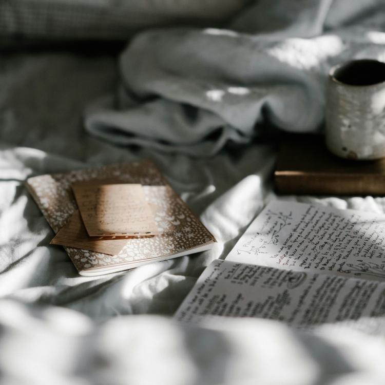 A cup of coffee with books