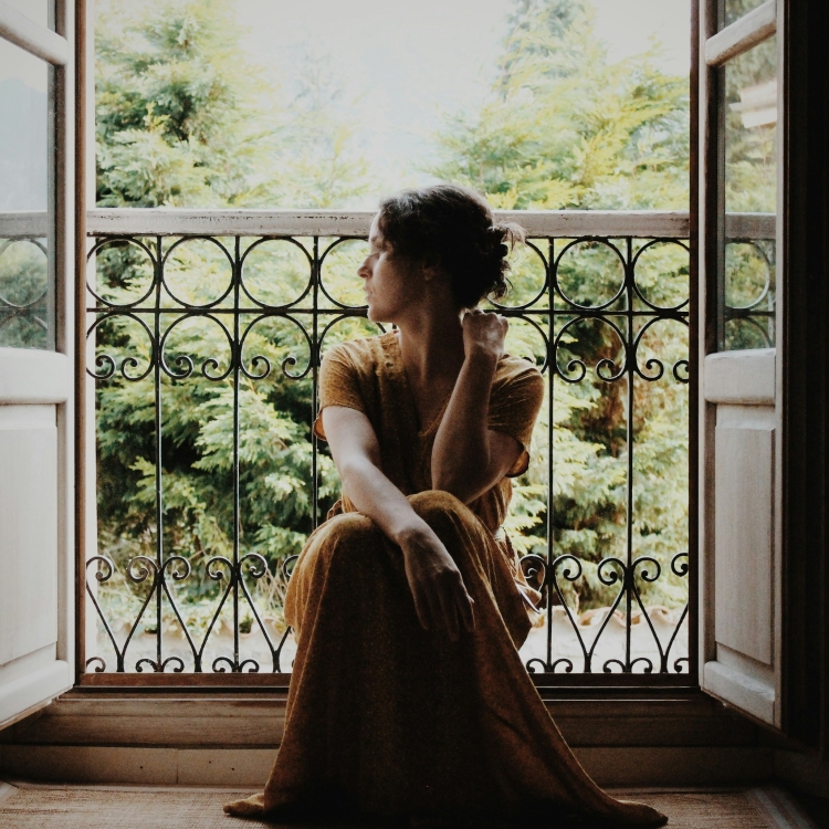 Woman sitting on the floor