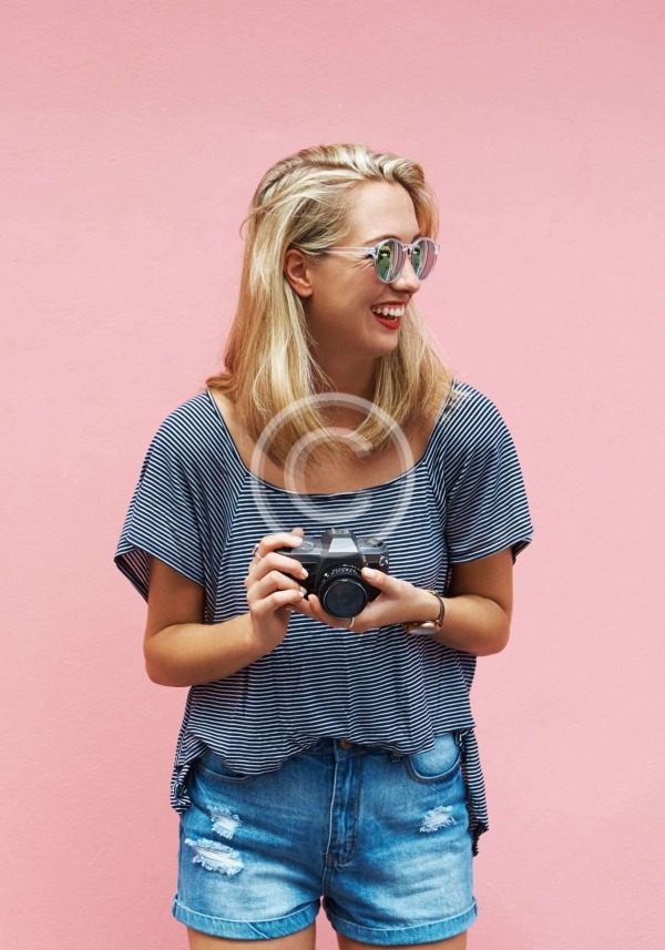 Woman with Camera - stock image